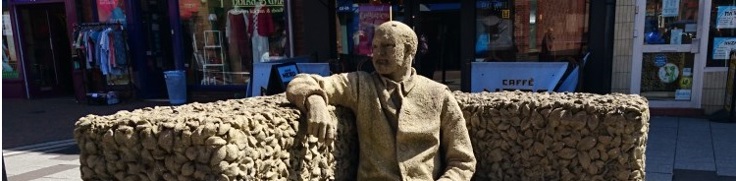 The Beeston Seat - Sculpture of Man Seated in Beeston