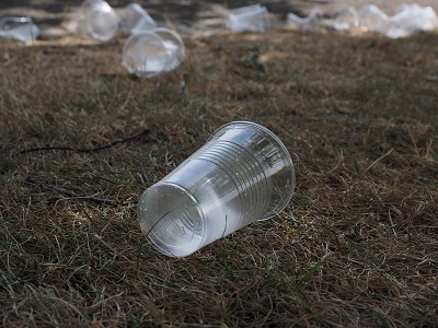 Plastic cup on the floor as litter