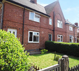 Council property with a front garden and gate