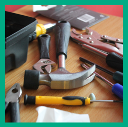 Selection of hand held tools on a table