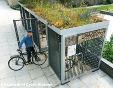 Cycle Storage Cage with Ecosystem on Roof. Older Man trying to park a bike.