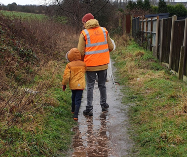 Two local residents taking part in a litter pick