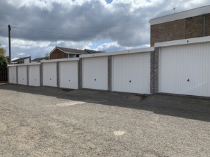 Caldbeck Court Garages - white doors