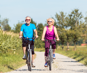 A couple on a bike ride in the countryside