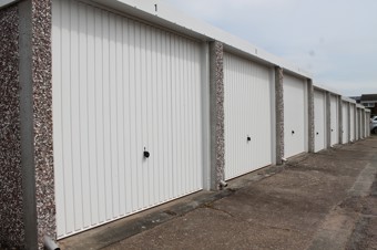 side view of ulldale garages in chilwell - white doors