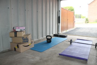 Storage and gym equipment in garage