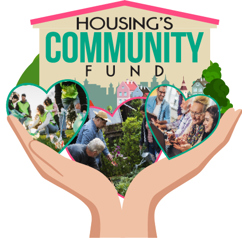 Heart in two hands with text saying 'Housing's community fund'