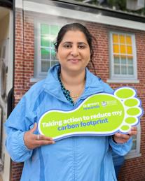 A local resident with a green rewards footprint saying: Taking action to reduce my carbon footprint