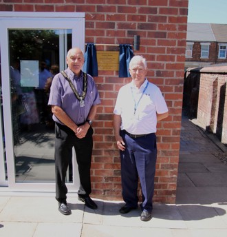 Mayor of Broxtowe, Councillor Bob Bullock, with a representative from the Canaan Trust