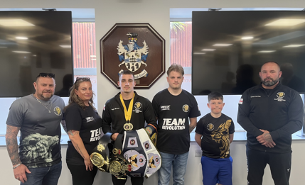 Taylor and his team in the council chamber