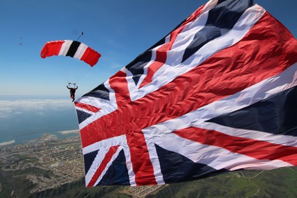 Red Devils with a large Union Jack flag