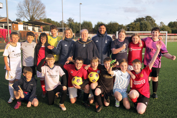 Karen Swan, Head of Community Engagement, Nottingham Forest Community Trust and Dante Diriso, Community Engagement Coordinator, Nottingham Forest Community Trust join the Mayor and children at the session