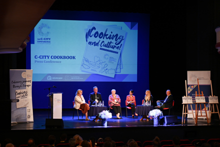 European delegates on stage for the launch of the C-City cookbook