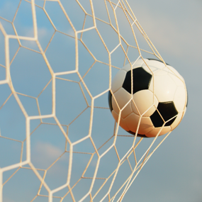 Football hitting the back of the net