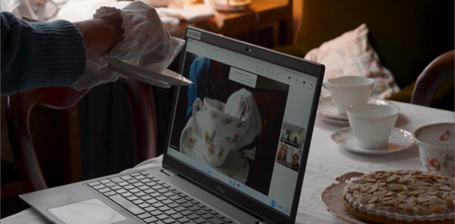 A digital tour being conducted on a laptop at the museum