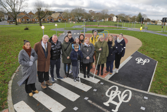 A group of people at the new cycle training track